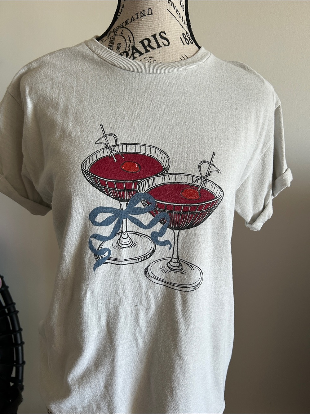 Anthropologie Cream Tee with Red Cocktail Graphic and Blue Bow